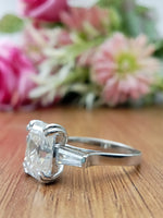 Load image into Gallery viewer, Emerald Cut Lab Grown Three Stone Wedding Ring