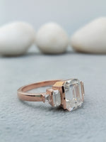 Load image into Gallery viewer, 14 kt rose gold emerald cut diamond ring
