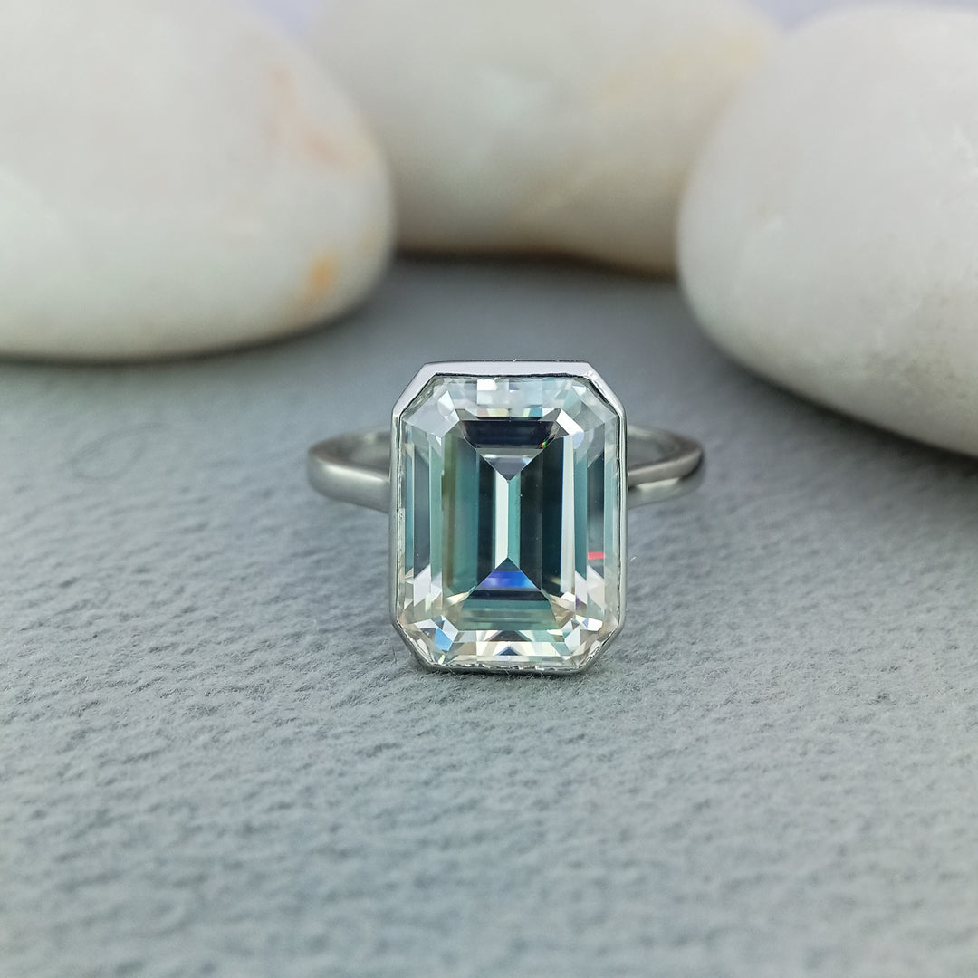 5.5 ct Emerald bezzel set engagement ring