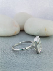 5.5 ct Emerald bezzel set engagement ring