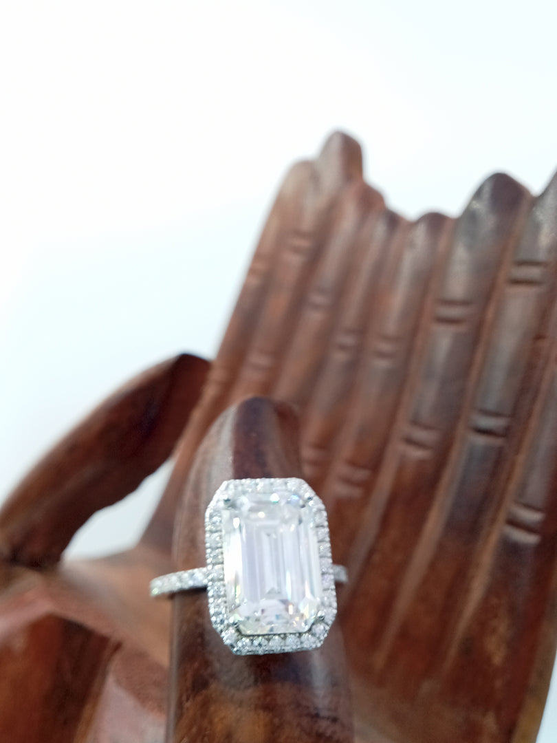 14 kt white gold Emerald cut diamond engagement ring